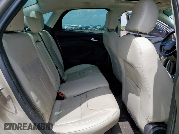 2018 Ford Focus Titanium z VIN 1FADP3J26JL279443, wystawiony jako Copart lot #58837435 z przebiegiem 136 538 mil mil oraz Szkoda całkowita • Salvage title. Historia ofert i sprzedaży dostępna na DreamBid. Obrazek 10.