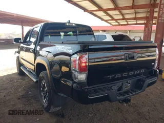 2021 Toyota Tacoma SR5 with VIN 5TFAZ5CN1MX111605, listed as a IAAI auction lot 42465381 with 67,307 mi miles and . Bid and sale history available at DreamBid. Image 3.