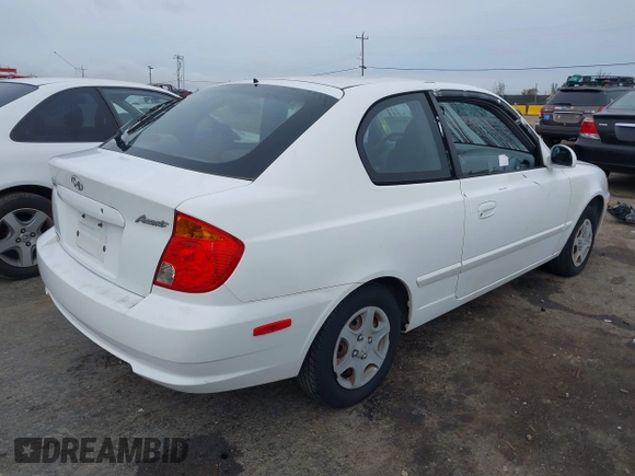 2005 Hyundai Accent GLS with VIN KMHCG35C45U327283, listed as a IAAI auction lot 41585862 with 85,791 mi miles. Bid and sale history available at carsss.com. Image 4.