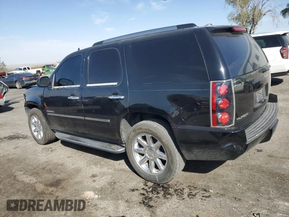 2014 GMC Yukon Denali z VIN 1GKS1EEF4ER230535, wystawiony jako Copart lot #76079844 z przebiegiem 153 180 mil mil oraz Szkoda całkowita • Salvage title. Historia ofert i sprzedaży dostępna na DreamBid. Obrazek 2.