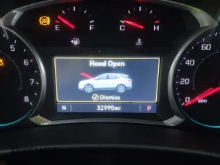 2021 Chevrolet Equinox Premier z VIN 2GNAXNEV7M6112087, wystawiony jako IAAI lot #41102702 z przebiegiem 32 995 mil mil oraz . Historia ofert i sprzedaży dostępna na DreamBid. Obrazek 7.