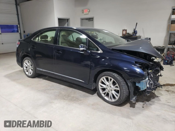 2010 Lexus HS 250h with VIN JTHBB1BA3A2005311, listed as a Copart auction lot 75595664 with 117,906 mi miles and Salvage Title. Bid and sale history available at DreamBid. Image 4.