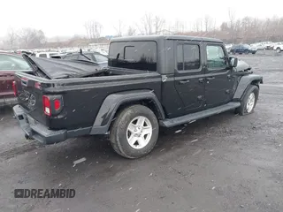 2022 Jeep Gladiator Texas Trail with VIN 1C6HJTAG1NL102451, listed as a IAAI auction lot 40969999 with 69,797 mi miles. Bid and sale history available at carsss.com. Image 4.