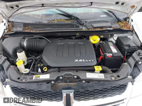 2015 Dodge Grand Caravan SE with VIN 2C4RDGBG2FR606610, listed as a IAAI auction lot 42197738 with 144,620 mi miles and . Bid and sale history available at DreamBid. Image 10.