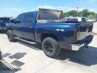 2008 Chevrolet Silverado 1500 LT w/1LT with VIN 2GCEK13C181173196, listed as a IAAI auction lot 41954657 with 212,388 mi miles. Bid and sale history available at carsss.com. Image 3.