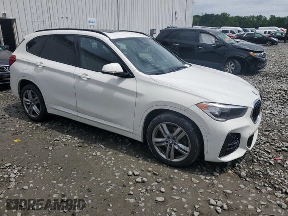 2021 BMW X1 xDrive28i with VIN WBXJG9C07M3M67312, listed as a Copart auction lot 59712835 with 62,371 mi miles and Salvage title. Bid and sale history available at DreamBid. Image 4.