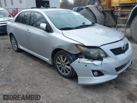 2009 Toyota Corolla with VIN 2T1BU40E69C123823, listed as a IAAI auction lot 42079964 with 204,124 mi miles. Bid and sale history available at carsss.com. Image 1.