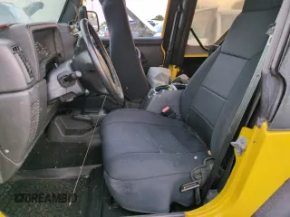 2003 Jeep Wrangler Sport with VIN 1J4FA49S93P373532, listed as a Copart auction lot 74595774 with 105,018 mi miles and Non Repairable. Bid and sale history available at carsss.com. Image 7.