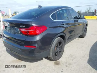 2015 BMW X4 xDrive28i z VIN 5UXXW3C54F0M87412, wystawiony jako IAAI lot #42038938 z przebiegiem 106 461 mil mil oraz . Historia ofert i sprzedaży dostępna na DreamBid. Obrazek 4.