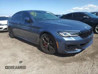 2023 BMW 5 Series M550i xDrive with VIN WBA13BK08PCN51125, listed as a Copart auction lot 76781294 with 8,855 mi miles and Non repairable. Bid and sale history available at DreamBid. Image 4.