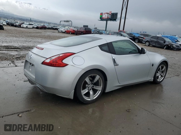 2009 Nissan 370Z Touring with VIN JN1AZ44E89M409220, listed as a Copart auction lot 43701504 with 145,099 mi miles and Salvage Title. Bid and sale history available at carsss.com. Image 3.