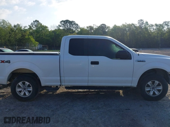 2016 Ford F-150 XLT with VIN 1FTFX1EF4GKE50550, listed as a IAAI auction lot 41974498 with 154,409 mi miles. Bid and sale history available at carsss.com. Image 14.