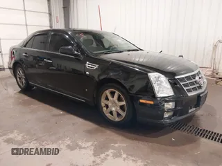 2008 Cadillac STS AWD z VIN 1G6DD67V780139292, wystawiony jako IAAI lot #41972933 z przebiegiem 210 891 mil mil oraz . Historia ofert i sprzedaży dostępna na DreamBid. Obrazek 1.