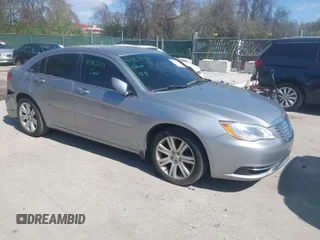 2013 Chrysler 200 Touring with VIN 1C3CCBBB4DN655936, listed as a IAAI auction lot 41963751 with 197,019 mi miles. Bid and sale history available at carsss.com. Image 1.