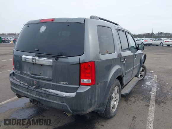 2011 Honda Pilot EX-L with VIN 5FNYF4H65BB009279, listed as a IAAI auction lot 41554301 with 226,337 mi miles and . Bid and sale history available at carsss.com. Image 4.