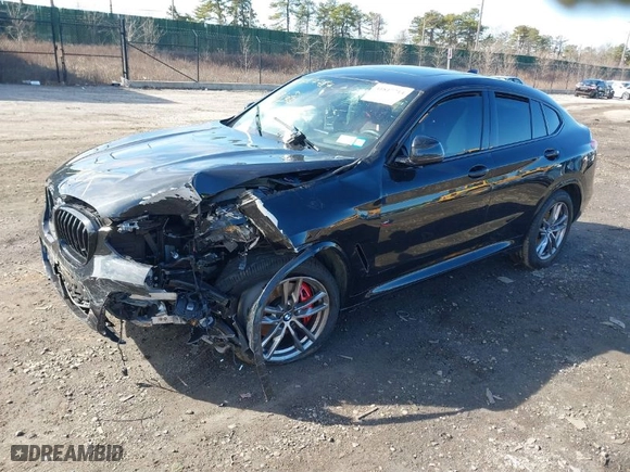2021 BMW X4 M40i with VIN 5UX2V5C03M9H54824, listed as a IAAI auction lot 41817714 with 34,880 mi miles. Bid and sale history available at carsss.com. Image 2.