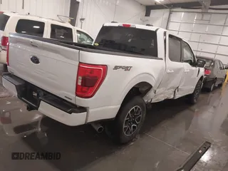 2023 Ford F-150 XL z VIN 1FTFW1E85PFA54558, wystawiony jako IAAI lot #42215749 z przebiegiem 22 476 mil mil oraz . Historia ofert i sprzedaży dostępna na DreamBid. Obrazek 4.