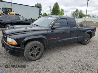 2001 Dodge Dakota z VIN 1B7GL22Z71S213949, wystawiony jako Copart lot #56553435 z przebiegiem 190 399 mil mil oraz Szkoda całkowita • Salvage title. Historia ofert i sprzedaży dostępna na DreamBid. Obrazek 1.