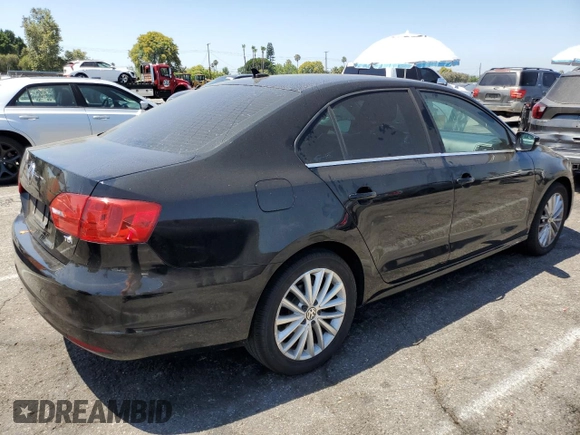 2014 Volkswagen Jetta TDI w/Premium with VIN 3VWLL7AJ8EM367587, listed as a Copart auction lot 63670815 with 129,289 mi miles and Clean title. Bid and sale history available at DreamBid. Image 3.