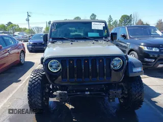 2022 Jeep Wrangler Unlimited Sport S with VIN 1C4HJXDG1NW200793, listed as a IAAI auction lot 41810817 with 35,212 mi miles. Bid and sale history available at carsss.com. Image 12.