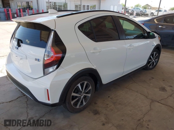 2018 Toyota Prius One with VIN JTDKDTB32J1600004, listed as a IAAI auction lot 42030186 with 61,568 mi miles and . Bid and sale history available at DreamBid. Image 4.