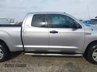 2010 Toyota Tundra z VIN 5TFUW5F14AX145662, wystawiony jako IAAI lot #41792711 z przebiegiem 241 445 mil mil oraz . Historia ofert i sprzedaży dostępna na DreamBid. Obrazek 13.