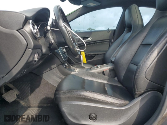 2014 Mercedes-Benz CLA 250 with VIN WDDSJ4GBXEN133966, listed as a Copart auction lot 59897715 with 100,509 mi miles and Salvage title. Bid and sale history available at DreamBid. Image 7.