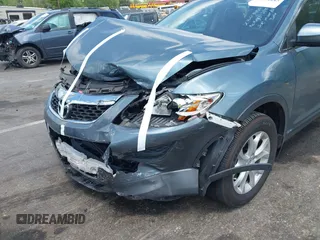 2012 Mazda CX-9 Touring z VIN JM3TB3CV0C0352698, wystawiony jako IAAI lot #42092613 z przebiegiem 75 118 mil mil oraz . Historia ofert i sprzedaży dostępna na DreamBid. Obrazek 6.