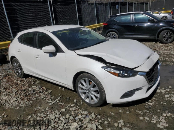2018 Mazda 3 Touring with VIN 3MZBN1L38JM275763, listed as a Copart auction lot 49219745 with 132,884 mi miles and Salvage Title. Bid and sale history available at DreamBid. Image 4.