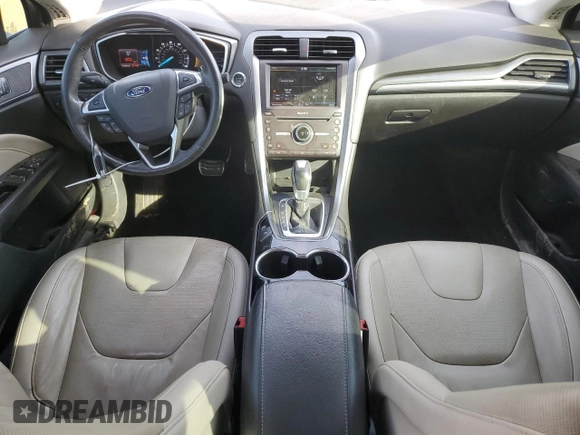 2016 Ford Fusion Titanium with VIN 3FA6P0K98GR319289, listed as a Copart auction lot 77114294 with 123,586 mi miles and Salvage Title. Bid and sale history available at DreamBid. Image 8.