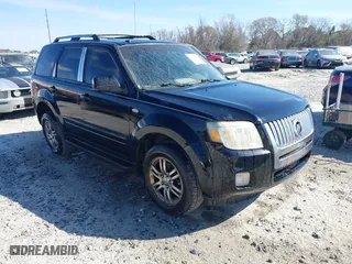 2009 Mercury Mariner Premier with VIN 4M2CU87G29KJ06738, listed as a IAAI auction lot 41659804 with 128,638 mi miles. Bid and sale history available at carsss.com. Image 1.