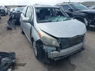 2013 Toyota Yaris L with VIN JTDJTUD31DD565265, listed as a IAAI auction lot 42493298 with 228,255 mi miles and . Bid and sale history available at DreamBid. Image 1.