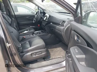 2020 Honda Pilot Elite with VIN 5FNYF6H00LB027472, listed as a IAAI auction lot 42253478 with 69,988 mi miles and . Bid and sale history available at DreamBid. Image 5.