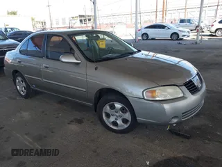 2006 Nissan Sentra S z VIN 3N1CB51D86L503554, wystawiony jako IAAI lot #41852165 z przebiegiem 210 410 mil mil oraz . Historia ofert i sprzedaży dostępna na DreamBid. Obrazek 1.