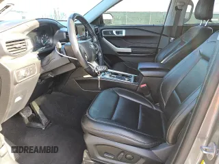 2022 Ford Explorer XLT with VIN 1FMSK8DH7NGA82496, listed as a Copart auction lot 51866865 with 77,014 mi miles and Clean Title. Bid and sale history available at carsss.com. Image 7.