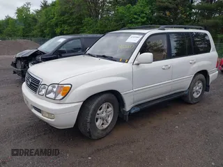 1998 Lexus LX 470 z VIN JT6HT00W9W0007768, wystawiony jako IAAI lot #42322883 z przebiegiem 227 546 mil mil oraz . Historia ofert i sprzedaży dostępna na DreamBid. Obrazek 2.