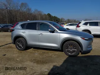 2020 Mazda CX-5 Touring with VIN JM3KFACM8L0727393, listed as a IAAI auction lot 41492627 with 91,521 mi miles. Bid and sale history available at carsss.com. Image 13.
