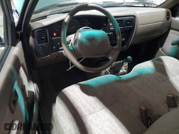 1999 Toyota Tacoma with VIN 4TANL42N4XZ453505, listed as a Copart auction lot 63399325 with 175,198 mi miles and Salvage title. Bid and sale history available at DreamBid. Image 8.