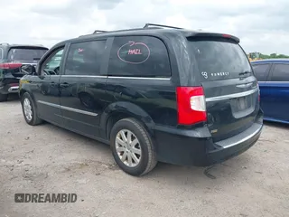 2016 Chrysler Town & Country Touring with VIN 2C4RC1BG7GR287707, listed as a IAAI auction lot 42136625 with 86,684 mi miles and . Bid and sale history available at DreamBid. Image 3.