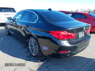 2019 BMW 5 Series 530e iPerformance with VIN WBAJA9C53KB388861, listed as a IAAI auction lot 41621712 with 68,128 mi miles. Bid and sale history available at carsss.com. Image 3.