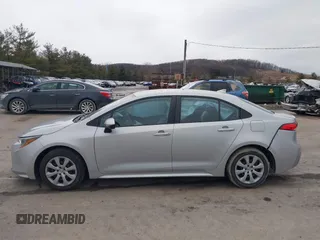 2022 Toyota Corolla LE with VIN 5YFEPMAE2NP327306, listed as a IAAI auction lot 41672881 with 38,791 mi miles and . Bid and sale history available at DreamBid. Image 14.