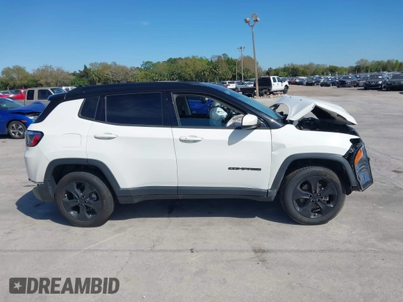 2021 Jeep Compass Latitude with VIN 3C4NJDBB7MT566237, listed as a IAAI auction lot 41747738 with 33,395 mi miles and . Bid and sale history available at DreamBid. Image 14.