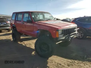1994 Jeep Cherokee SE with VIN 1J4FJ28S7RL254870, listed as a Copart auction lot 85783884 with 268,569 mi miles and Salvage Title. Bid and sale history available at carsss.com. Image 4.