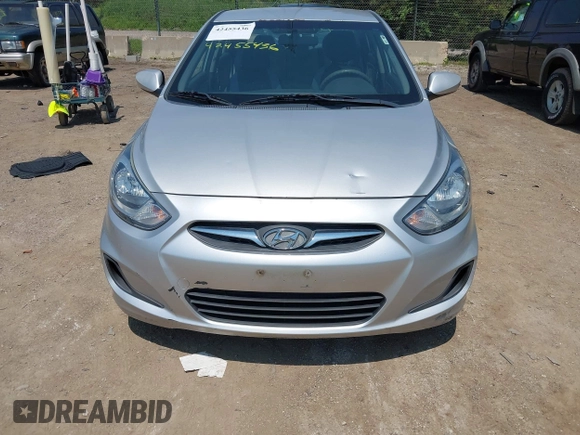 2014 Hyundai Accent GLS z VIN KMHCT4AE1EU637366, wystawiony jako IAAI lot #42455436 z przebiegiem 121 764 mil mil oraz . Historia ofert i sprzedaży dostępna na DreamBid. Obrazek 6.
