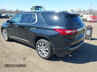 2018 Chevrolet Traverse Premier with VIN 1GNEVJKW8JJ159561, listed as a IAAI auction lot 41774914 with 132,598 mi miles and . Bid and sale history available at DreamBid. Image 3.