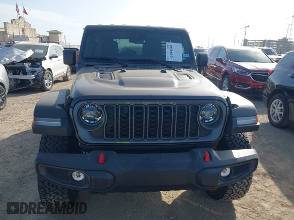 2025 Jeep Wrangler Rubicon with VIN 1C4PJXFNXSW532895, listed as a IAAI auction lot 42694548 with 1,886 mi miles and . Bid and sale history available at DreamBid. Image 12.