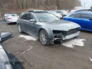 2015 Audi A8 L 4.0T with VIN WAU32AFD4FN041084, listed as a IAAI auction lot 41450453 with 86,199 mi miles. Bid and sale history available at carsss.com. Image 1.