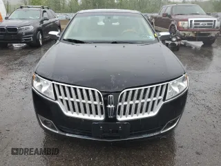 2012 Lincoln MKZ z VIN 3LNHL2GC3CR807053, wystawiony jako Copart lot #56425195 z przebiegiem 114 669 mil mil oraz Czysty tytuł • Clean title. Historia ofert i sprzedaży dostępna na DreamBid. Obrazek 5.