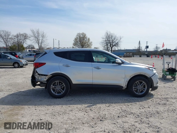2017 Hyundai Santa Fe 2.4L z VIN 5XYZTDLB8HG465425, wystawiony jako IAAI lot #42041881 z przebiegiem 103 161 mil mil oraz . Historia ofert i sprzedaży dostępna na DreamBid. Obrazek 13.