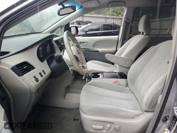 2012 Toyota Sienna LE AAS with VIN 5TDKK3DC8CS224112, listed as a Copart auction lot 59701725 with 200,726 mi miles and Salvage title. Bid and sale history available at DreamBid. Image 7.